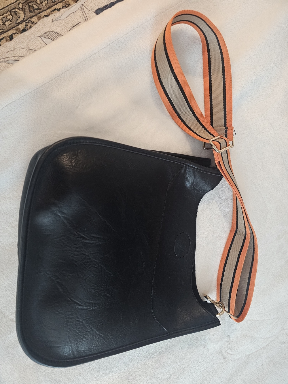 Black Leather Crossbody Bag with Orange Accent Strap